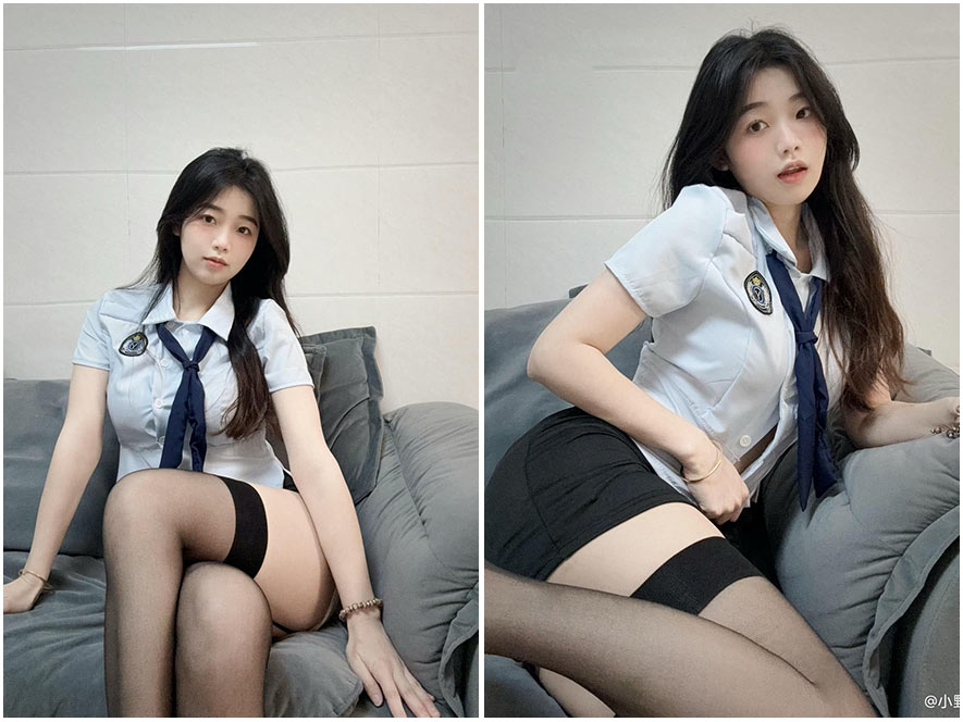 是小野马身穿日系校服JK制服坐在课桌上的写真,双腿修长白皙,不仅清纯而且略带诱惑